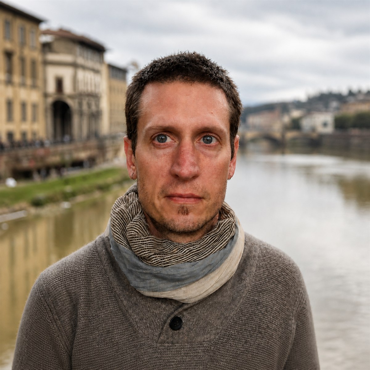 Portrait of Andrew Nelson outdoors beside a river